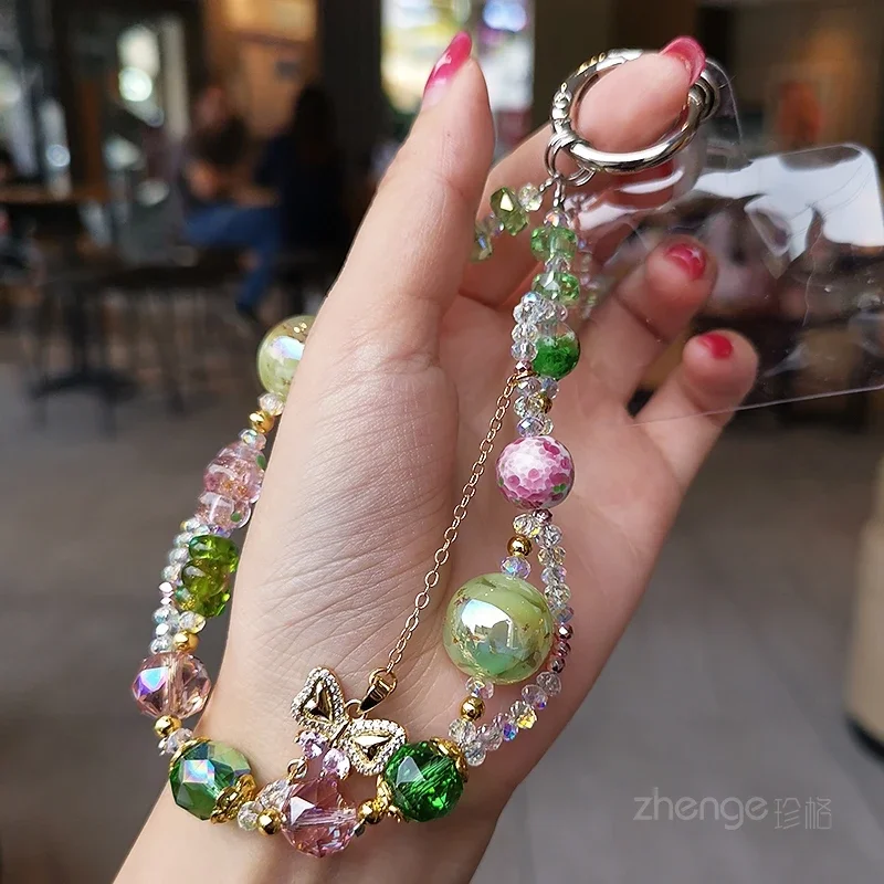 สร้อยข้อมือคริสตัลจี้รูปผีเสื้อสายชาร์จมือถือแบบสั้นสร้อยข้อมือห้อยข้อมือสลิงสากลแบบเคสโทรศัพท์มือถือ