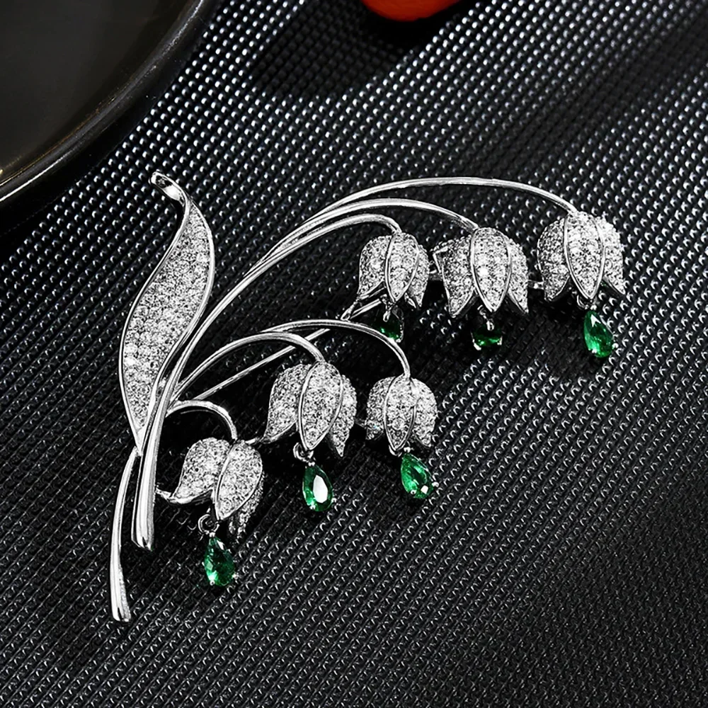 Broche orchidée Cloche pour femme, incrustée de Zwords sur cristal vert, broche de costume luxueuse, broche de corintersection de manteau, cadeaux de bijoux de mariage