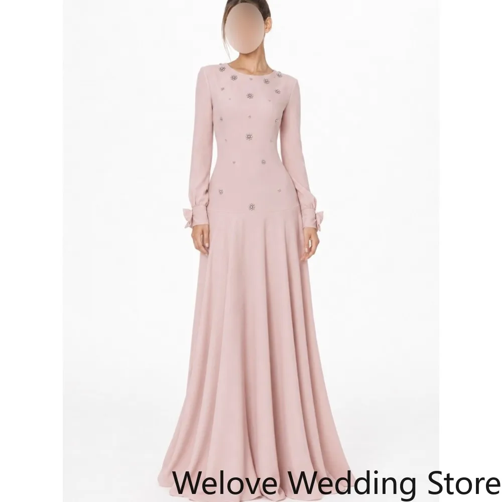 

Elegant Dusty Pink Formal Evening Gown With Round Neckline, Long Sleeves With Bow Cuffs, Delicate Rhinestone Beaded Detail