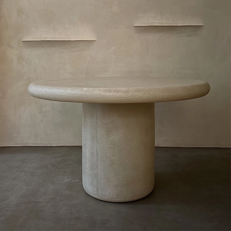 Pebble style dining table, modern and minimalist model room, restaurant circular table