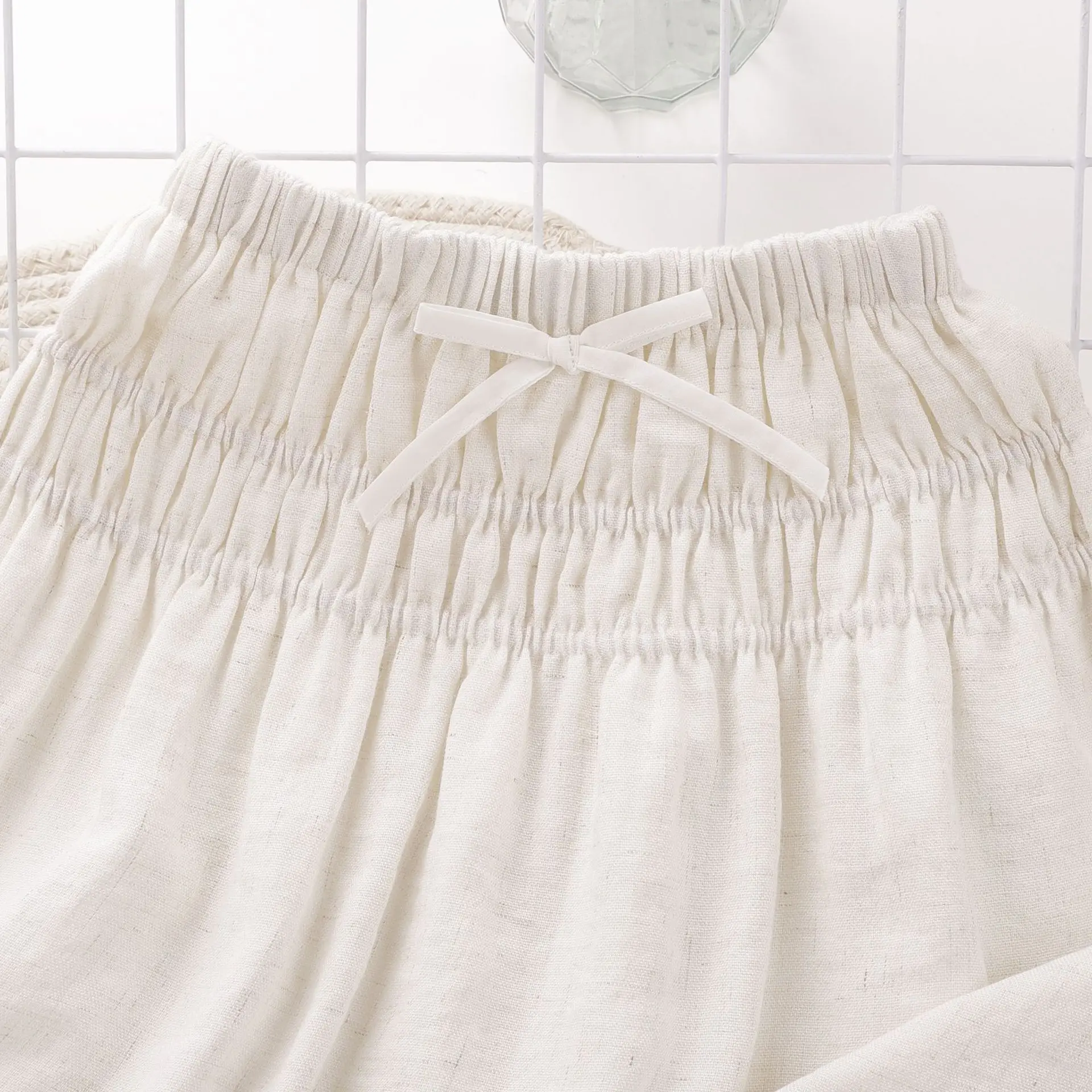 تنورة كورية متعددة الاستخدامات قابلة للتنفس وخفيفة الوزن للأطفال البنات تنورة ميدي من نسيج القطن والكتان مع فيونكة جديدة ولطيفة