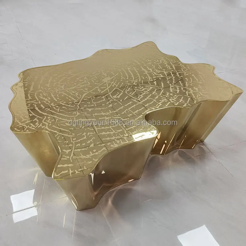 

Irregularly shaped luxury coffee table with unique design, top etched stump texture, stainless steel brass center table