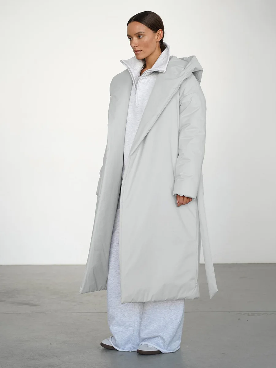 معطف نسائي شتوي جديد لعام 2025 بقلنسوة طويل سميك دافئ من القطن سترة منتفخة معطف نسائي مقاوم للماء معاطف الشارع للركاب