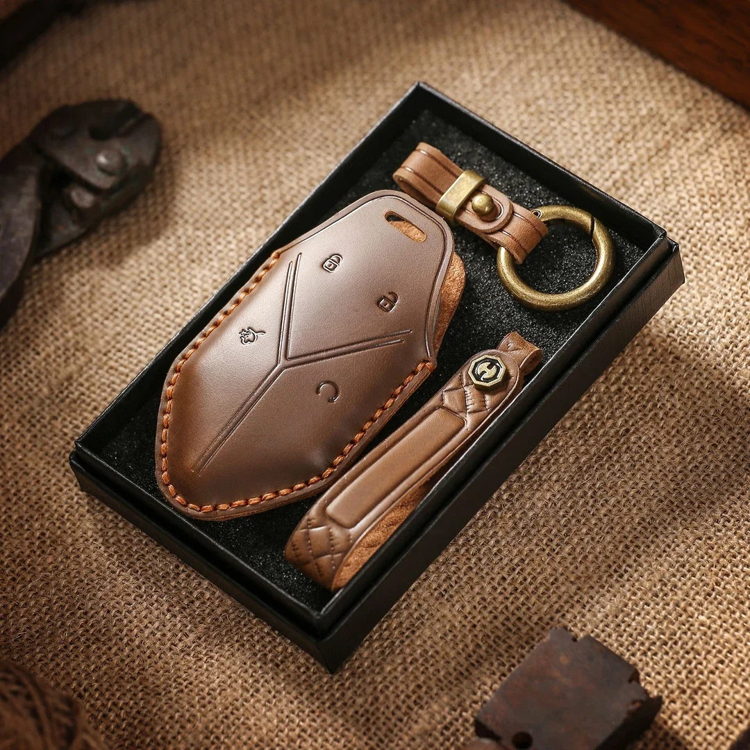 The first layer of cowhide key cover, the new genuine leather all-inclusive high-end shell men