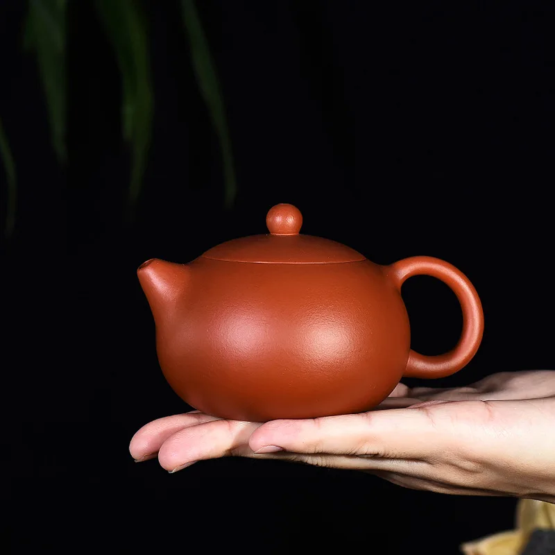 Yixing original mine purple clay teapot, handmade by famous masters, with red clay inlaid lid, ball hole, and Xishi as the agent