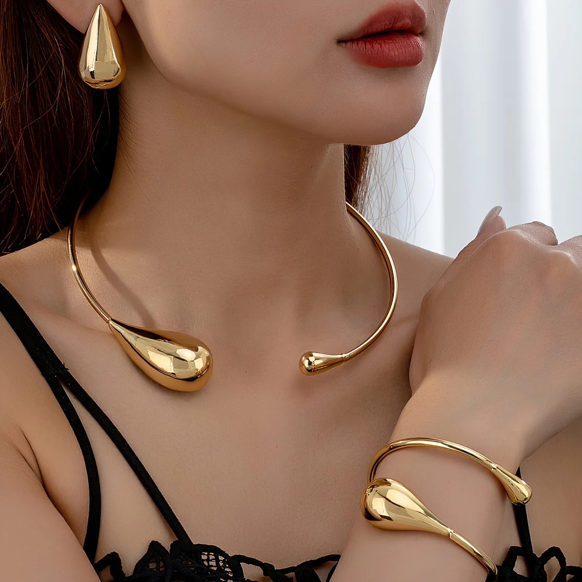 Conjunto de joyería minimalista en forma de lágrima de estilo vintage: conjunto de collar, pulsera y pendientes de aleación de zinc para uso diario