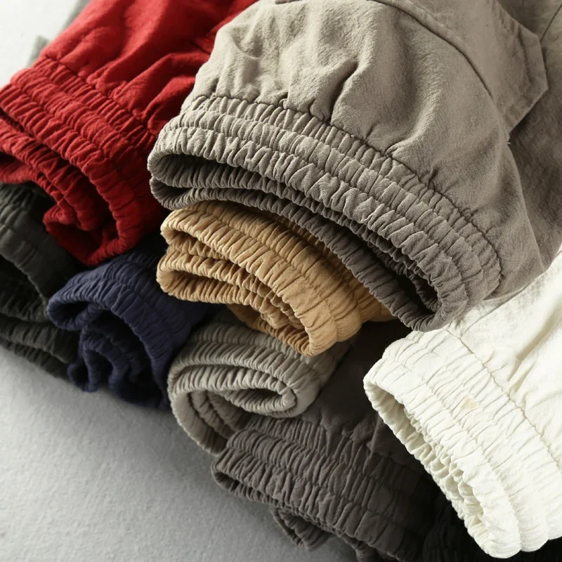 Schinteon letnie męskie codzienne bawełniane lniane spodenki do kolan plażowe spodenki z elastyczną talią jednokolorowe wygodne spodnie nowość