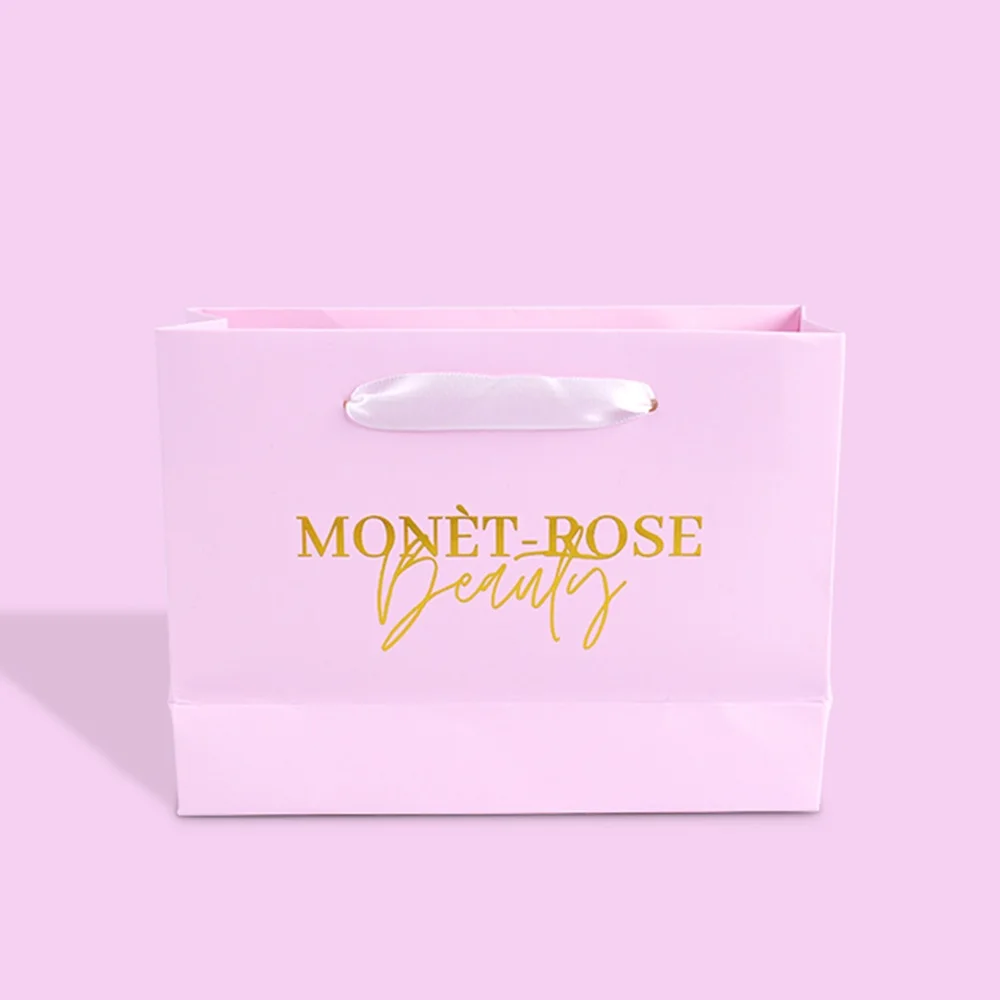 

500pcs/Lot Wholesale Hot Sale Custom Logo Printed Pink Cosmetic Paper Gift Bags for Shopping Clothing With Gold Foil Stamping