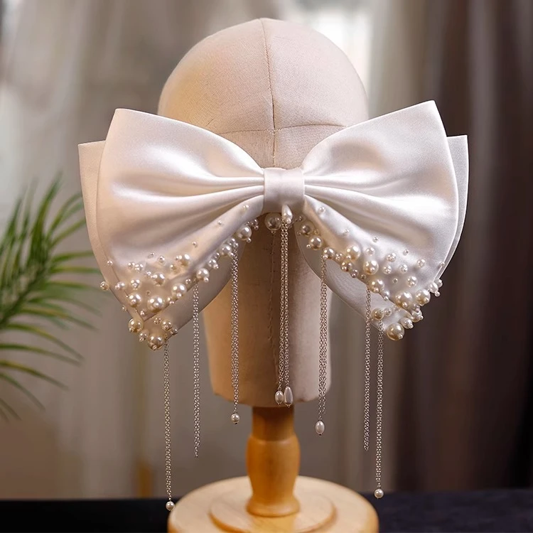 Français cousu à la main perle Satin exquis arc épingle à cheveux robe de mariée robe de mariée robe de grillage accessoires de robe