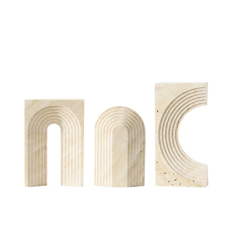 

Modern wabi-sabi style natural travertine, arched entrance ornaments, bookcases, soft furnishings, art and crafts