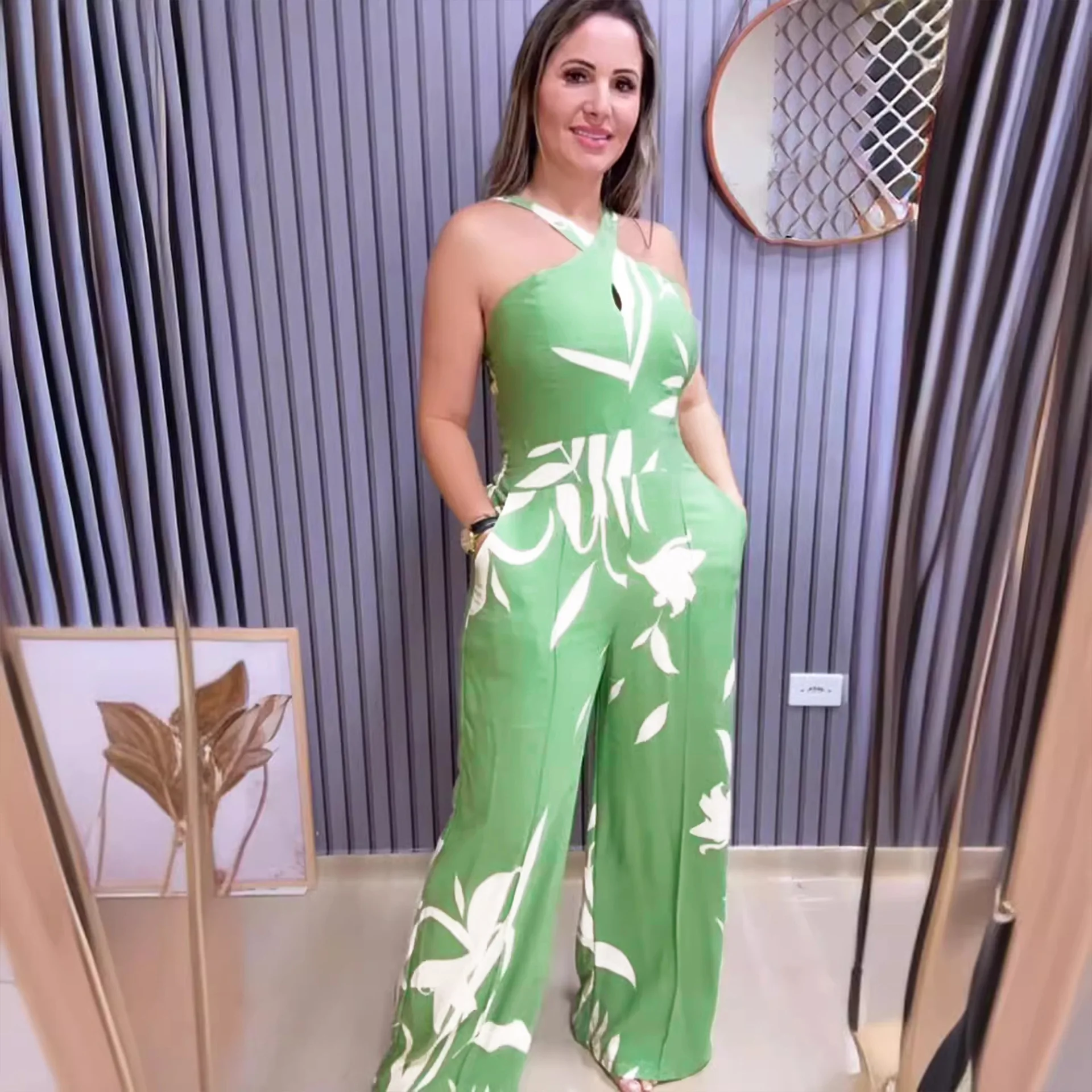 Mono de mujer estampado hueco colgante cuello tirantes sin mangas Sexy espalda descubierta mono de pierna ancha 2025 verano