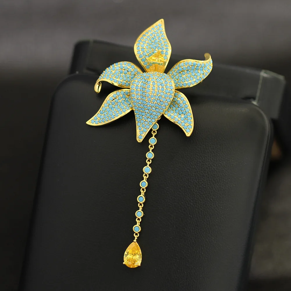 high-end-pedra-azul-incrustada-iris-flor-broche-elegante-e-luxuoso-borla-broche-temperamento-e-acessorio-versatil-para-mulher