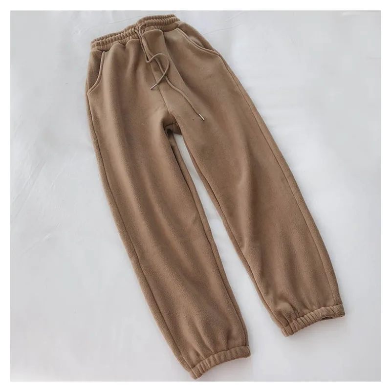 Koreańskie spodnie sportowe 2025 damskie zimowe ocieplane luźne spodnie z szerokimi nogawkami wyszczuplające i uniwersalne spodnie codzienne z szerokimi nogawkami