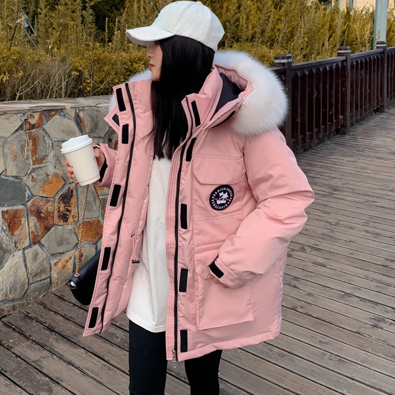 2023 inverno nuova moda con cappuccio piumino imbottito da donna ispessimento inverno Outdoor giacca da neve coppia Tooling giacca cappotto