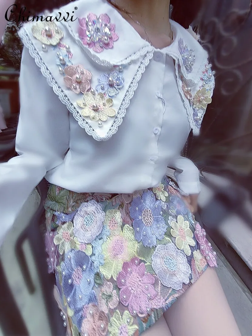 Camicia arruffata con fiore colorato di cristallo tridimensionale della linfa dell\'industria pesante autunno camicetta a maniche lunghe dolce di