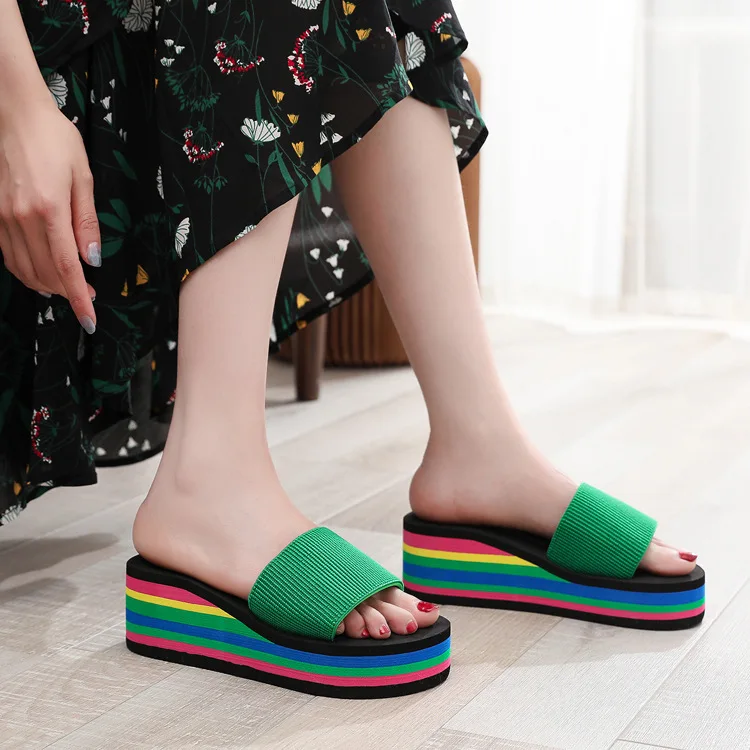 Thick soled fashionable women\'s slippers new European style color stripe trend casual slope heel raised beach one line sandals