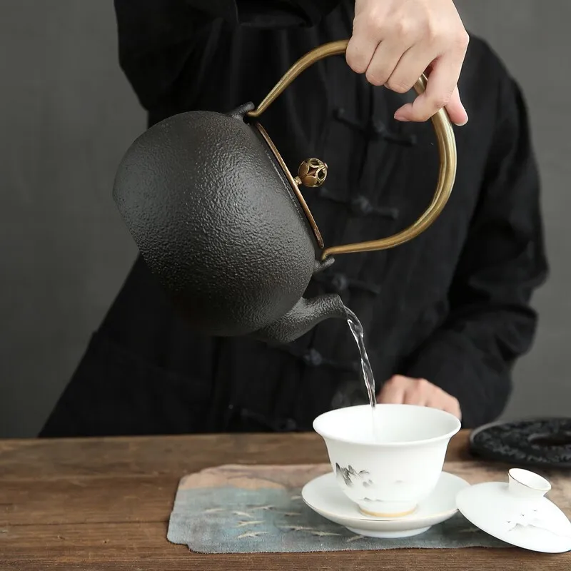 

Cast Iron Teapot for Stove Top Brewing, Gold Inlaid Handmade Kettle with Lid, Compatible with Electric & Charcoal Heating