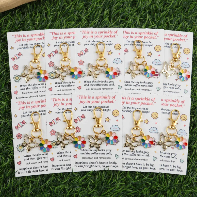 10A whimsical butterfly keychain set With rainbow flower pendant Comes with an inspirational greeting card Can write blessing me