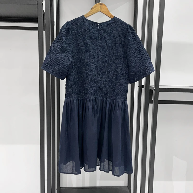 2026 Women's Textured Smocked Mini Dress | Short Sleeve Round Neck Ruffle Hem Dress (Available in White & Navy)