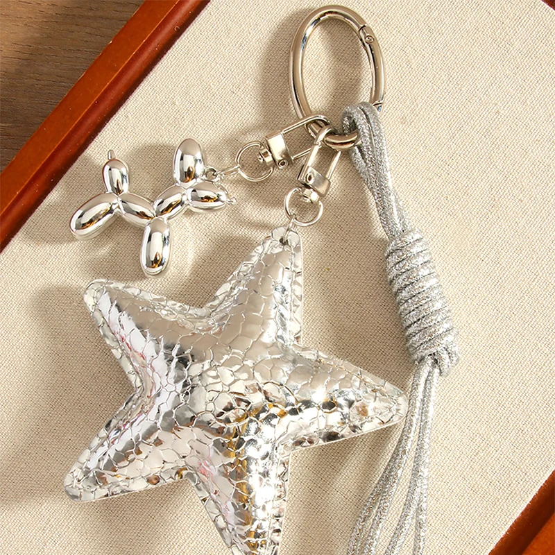 Miu نمط الخماسية نجمة الجلود القوس حقيبة سحر Y2K ليوبارد طباعة مطرز المفاتيح لطيف كيرينغ الإكسسوارات النساء محفظة الحلي