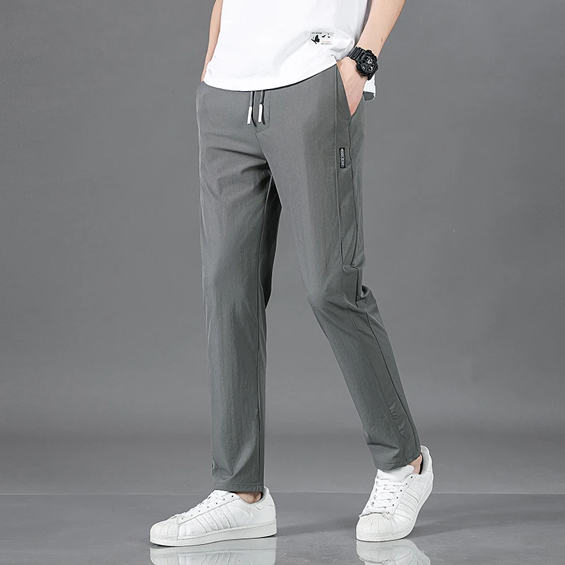 

Men's New Casual Pants Fashion Stretch Straight Slim Pants Summer Thin Ice Silk Loose Everything Trend Foreign Jogging Pants