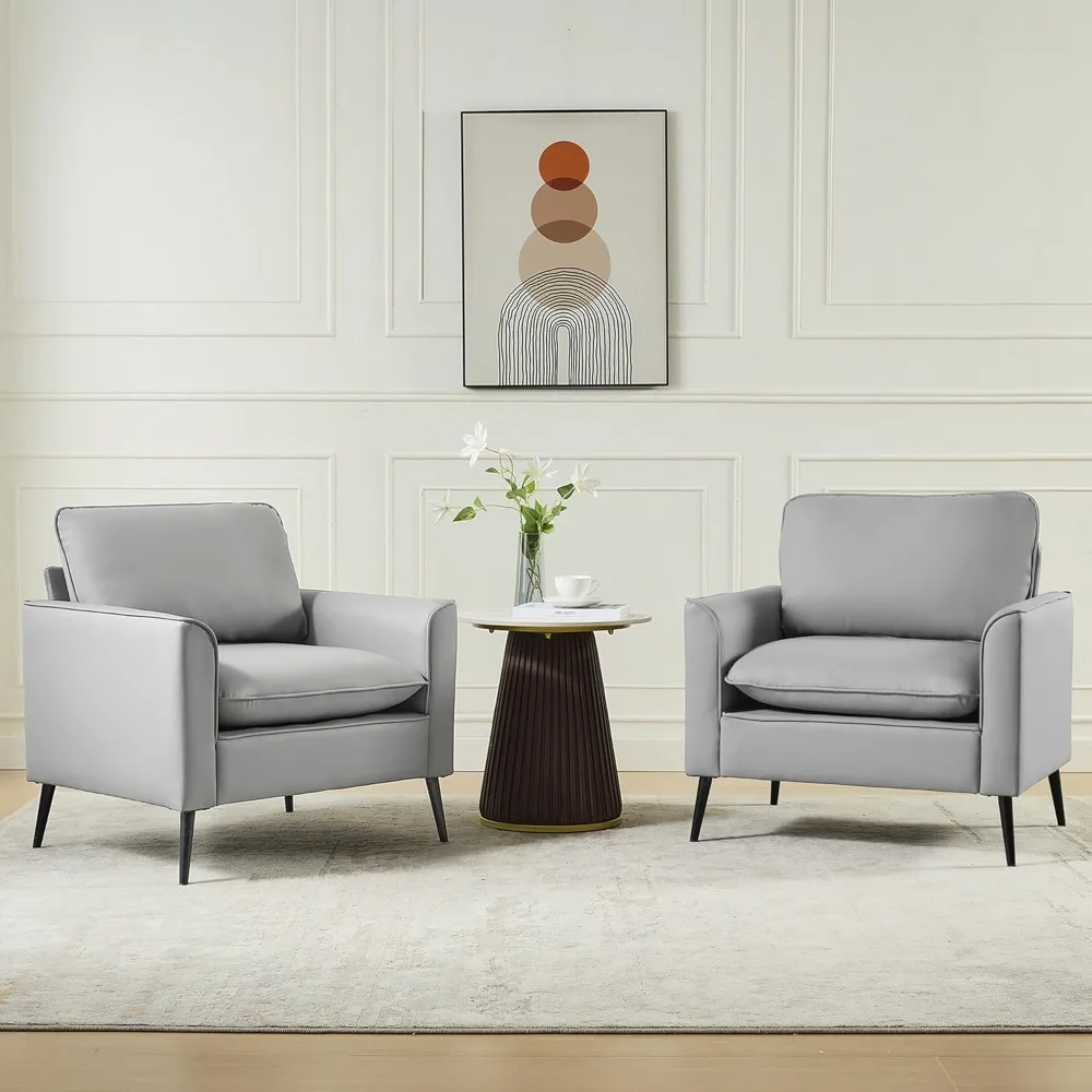 

pair of accent chairs: faux leather, mid-century modern style, comfortable living room and office reading seating for cozy recep