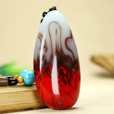 

Exquisite Hetian Chicken Blood Jade Original Stone Pendant