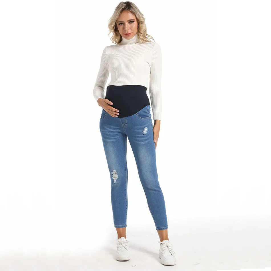 

Casual and Stylish Light Blue Maternity Jeans with Ripped Details Designed for Comfortable Pregnancy Experience Pants