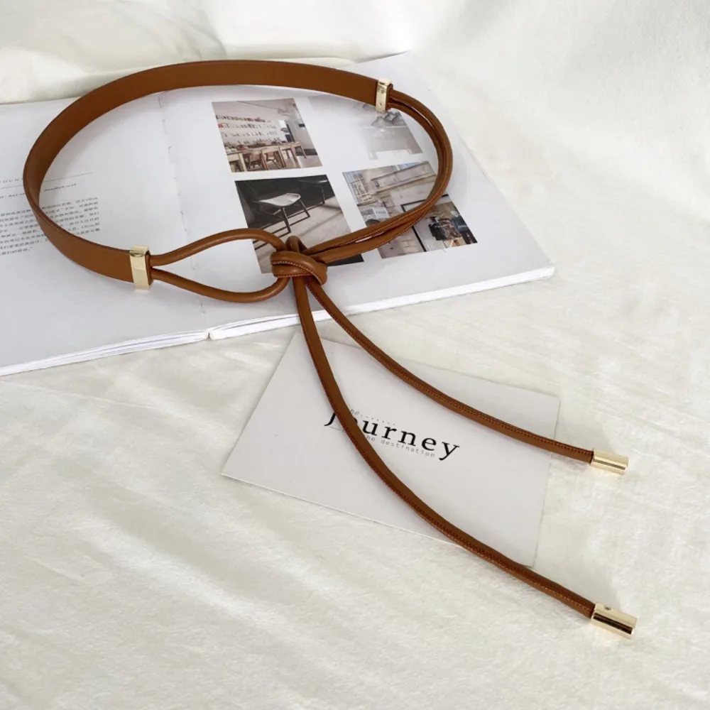 جديد غير ثقب عقدة نمط أحزمة الدانتيل متابعة بولي Leather الجلود رقيقة حزام بلون معطف الملحقات امرأة