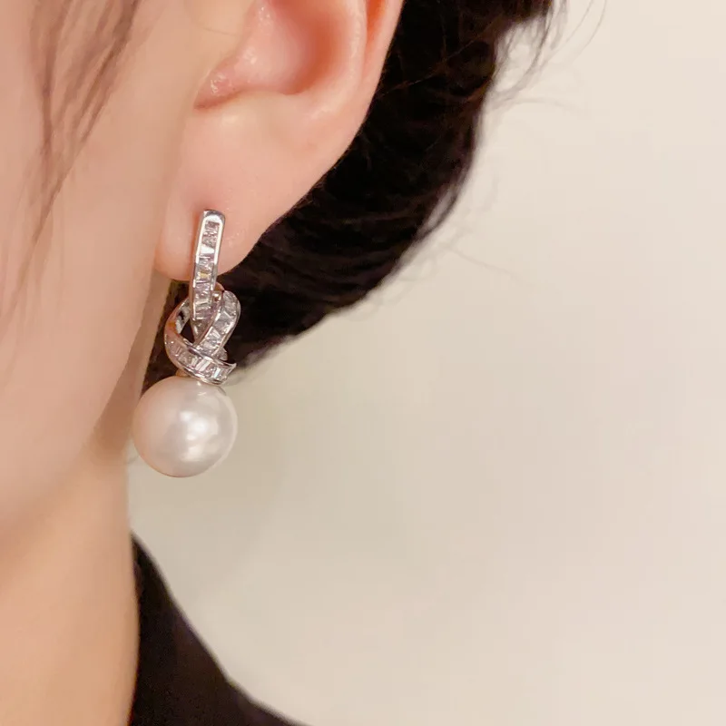 Light Luxury Micro Inlaid Zircon Knotted Pearl 925 Silver Needle Exquisite and Fashionable Super Sparkling Earrings