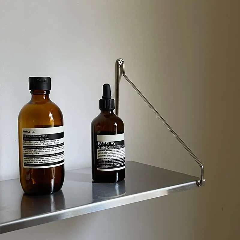 Medieval stainless steel wall shelf bookshelf one-word shelf living room background wall
