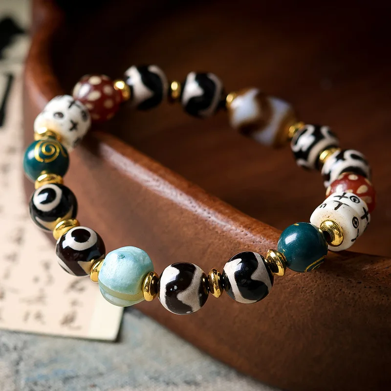 Original design tiger tooth jewelry bottle, three-eyed dzi , deer antler separator, multi-bead bracelet, cultural t