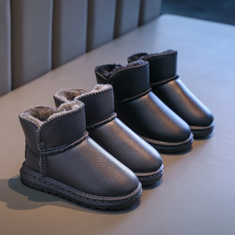 

New children's snow boots, boys' anti slip thickened and plush big cotton shoes, girls' warm short boots,kids snow boots