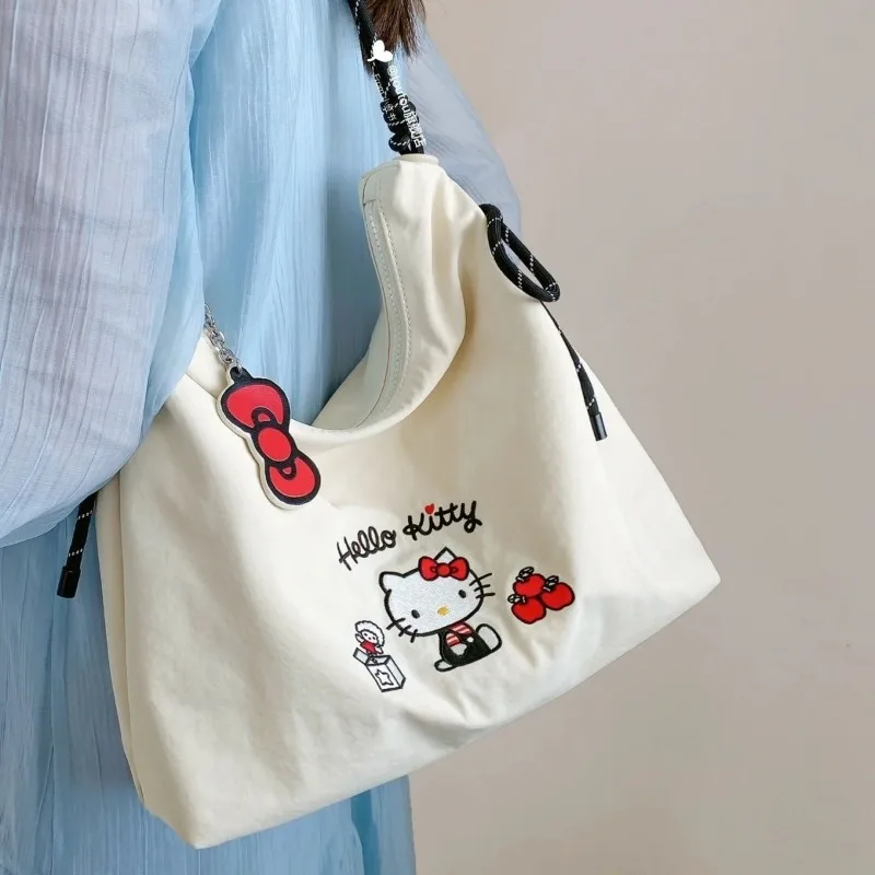 

Новая холщовая сумка через плечо с вышивкой мультфильма Sanrio для женской моды, большая вместительная портативная уличная сумка-тоут