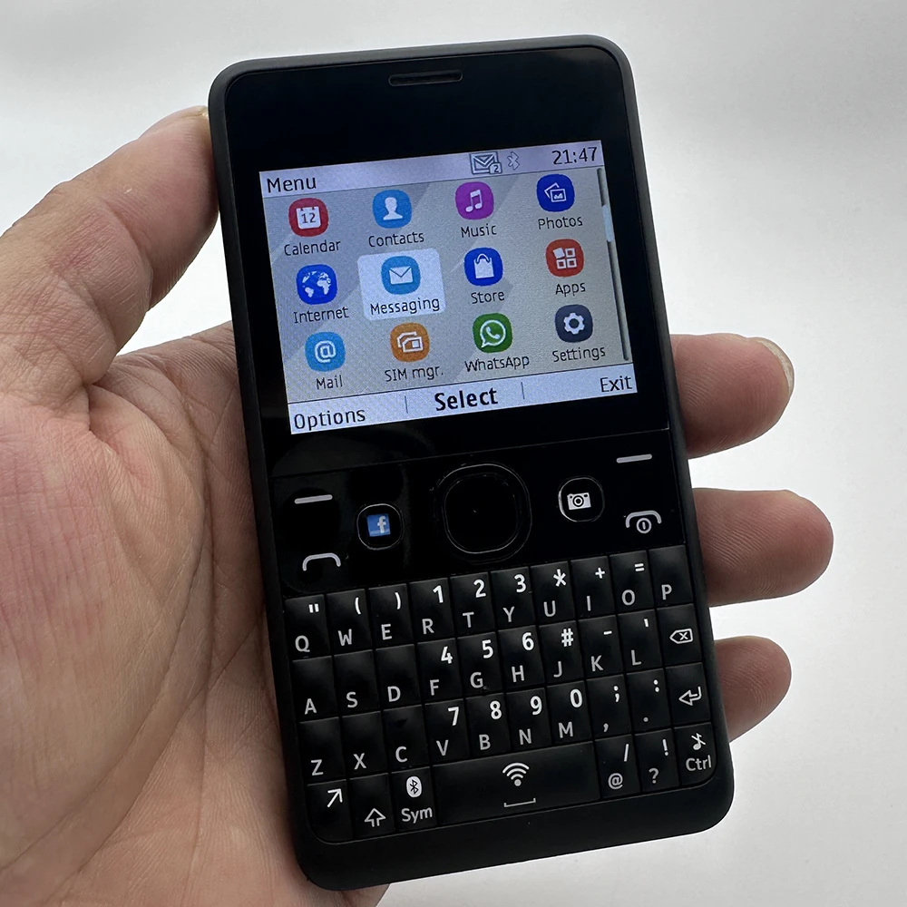 هاتف محمول Asha 210 ثنائي الشريحة GSM 2G QWERTY لوحة مفاتيح بلوتوث واي فاي هاتف محمول غير مقفول. صنع في عام 2013