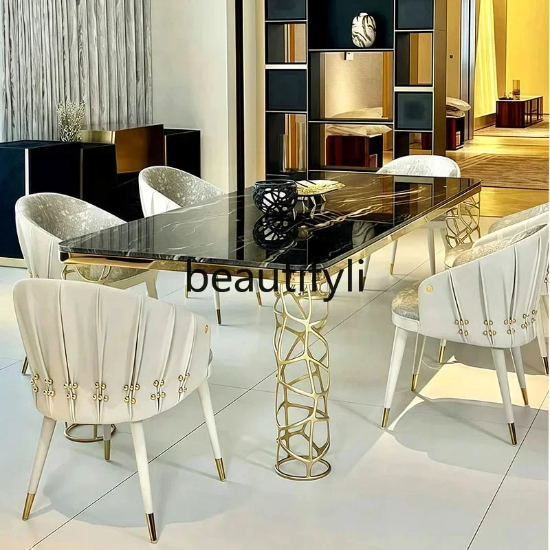 

Light luxury travertine dining table and chair combination high-end hollow square table stainless steel dining table