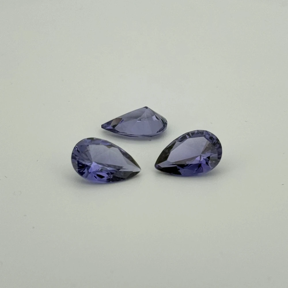 Synethetic Alexander Gemstone Emerald Pear Oval Cut Color Change Purple Corundum Stone