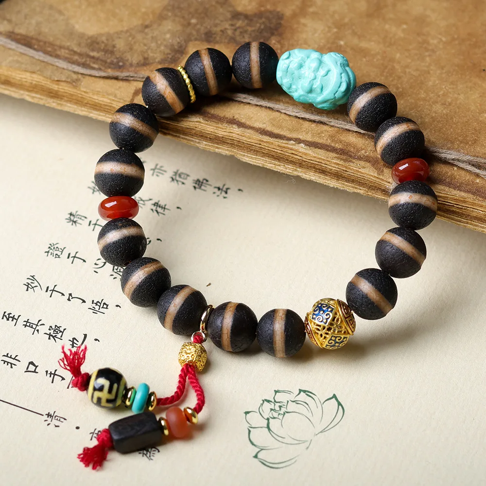 

A line of wrapped dzi bead bracelet Cultural Games magnesite turquoise God of Fortune Chinese style bracelet