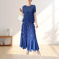 Nuevo Traje de estilo Miyake plisado de burbujas hecho a mano de manga corta, media falda elástica con cintura elástica, moda informal cómoda para mujer