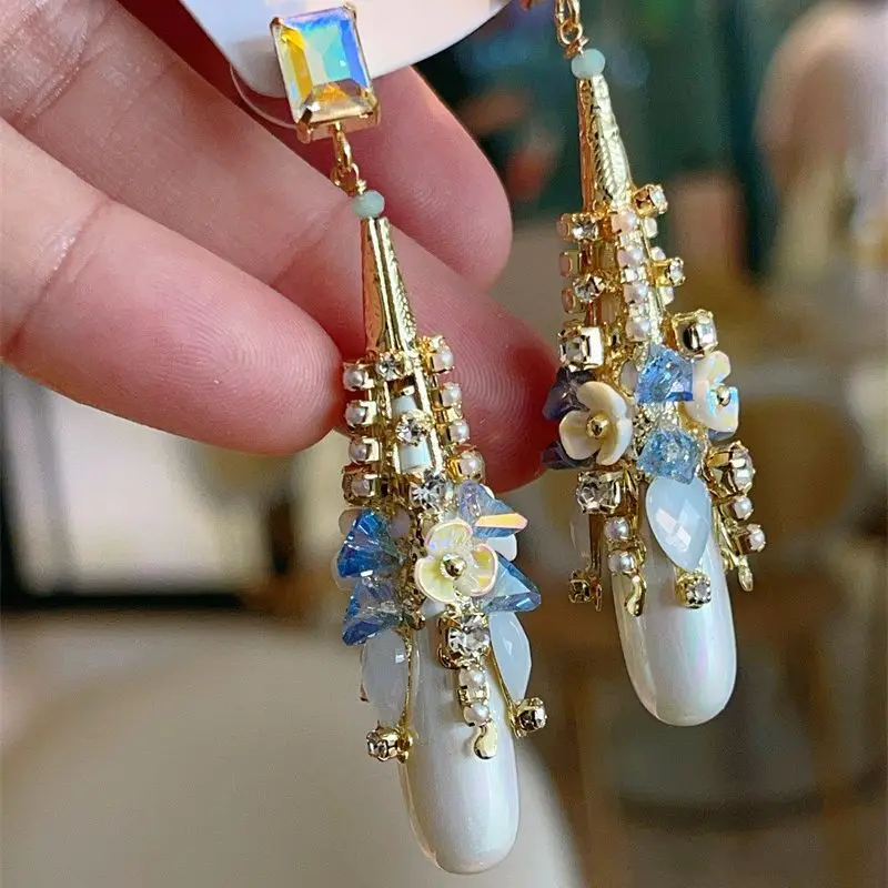 Bohemian handmade exaggerated hollow drop glass earrings high quality French niche design catwalk elegant earrings