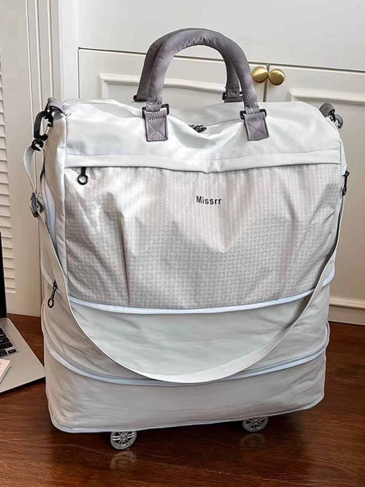new-women's-large-capacity-lightweight-roller-bag-travel-bag-with-universal-wheels-folding-design-for-business-trips-and-vaca