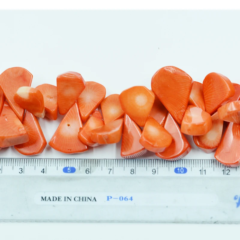 1 strand natural orange coral loose beads in the shape of melon seeds. A true DIY craftsman. Collectibles