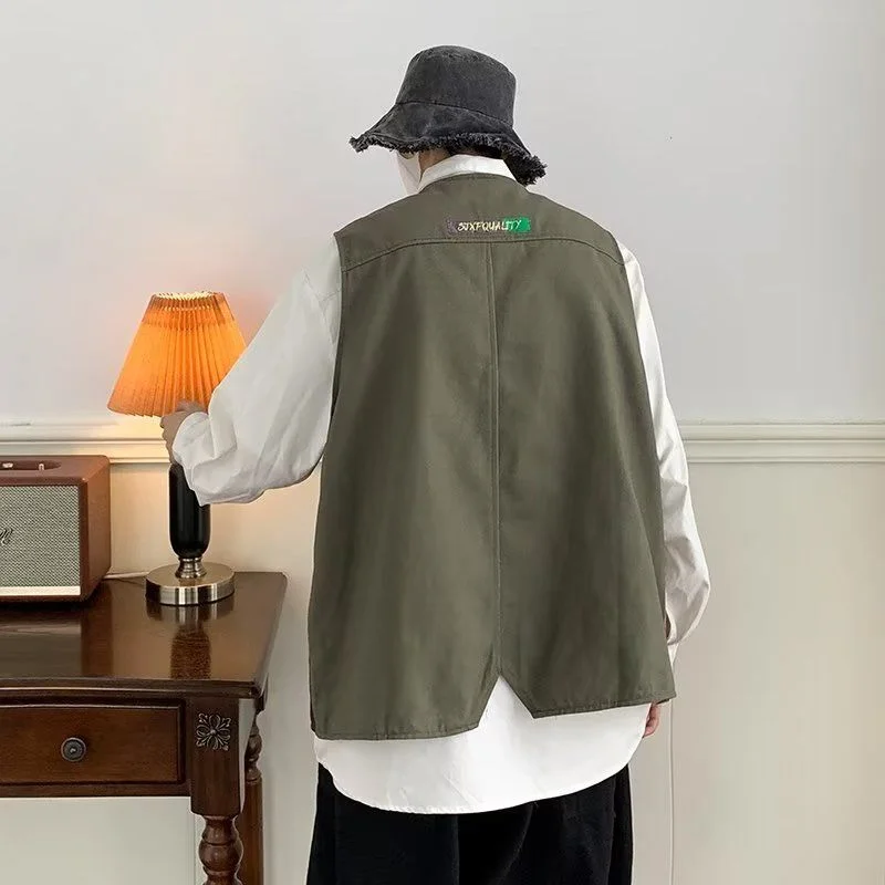 เสื้อกั๊กทำงานสไตล์ฮ่องกงย้อนยุค ตัดสีสันสวยงาม ทันสมัย ใช้ได้หลากหลาย เหมาะสำหรับผู้ชายและผู้หญิง แบบหลวมๆ ไม่มีแขน