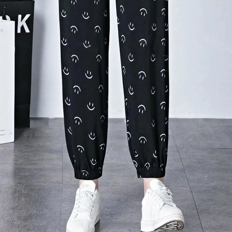 Ice Silk Women's 2024 Summer New Patchwork Elasticized High-waisted Pocket Printed Fashion Loose Minimalist Casual Harem Pants