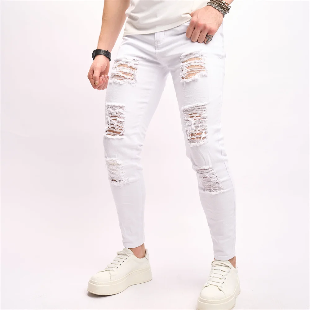 Eleganti fori Distressed Street Style uomo Jeans Skinny pantaloni Slim elasticizzati maschili pantaloni in Denim a matita strappati solidi