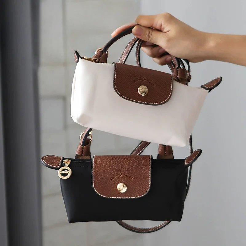 Mini bolso Longji, bolso de maquillaje Premium con bola de masa francesa, bolso cruzado de mano con correa de hombro no perforada de cuero de nailon