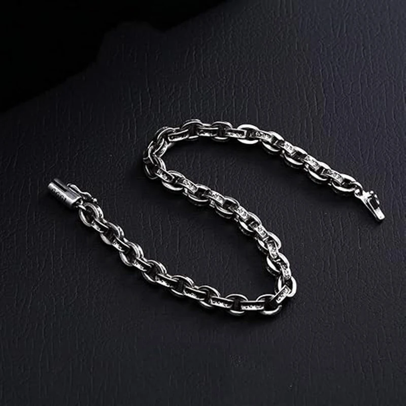 قلادة وسوار فضي اللون، منقوشة بأنماط وتصميم مشبك توقيع عام 1995. #5