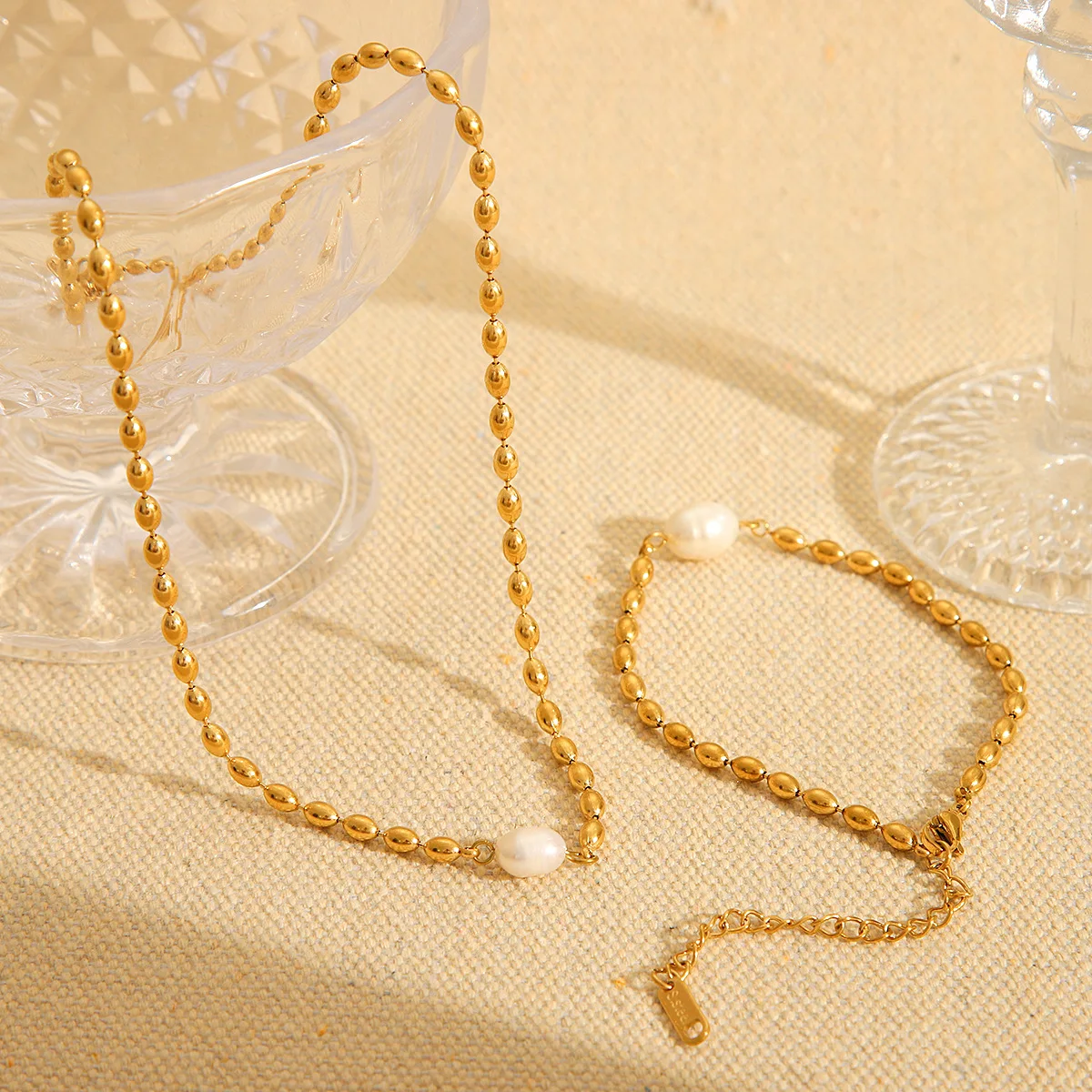 

Custom Processing French Style Natural Freshwater Pearl Oval Gold Bead Necklace Stainless Steel Bracelet