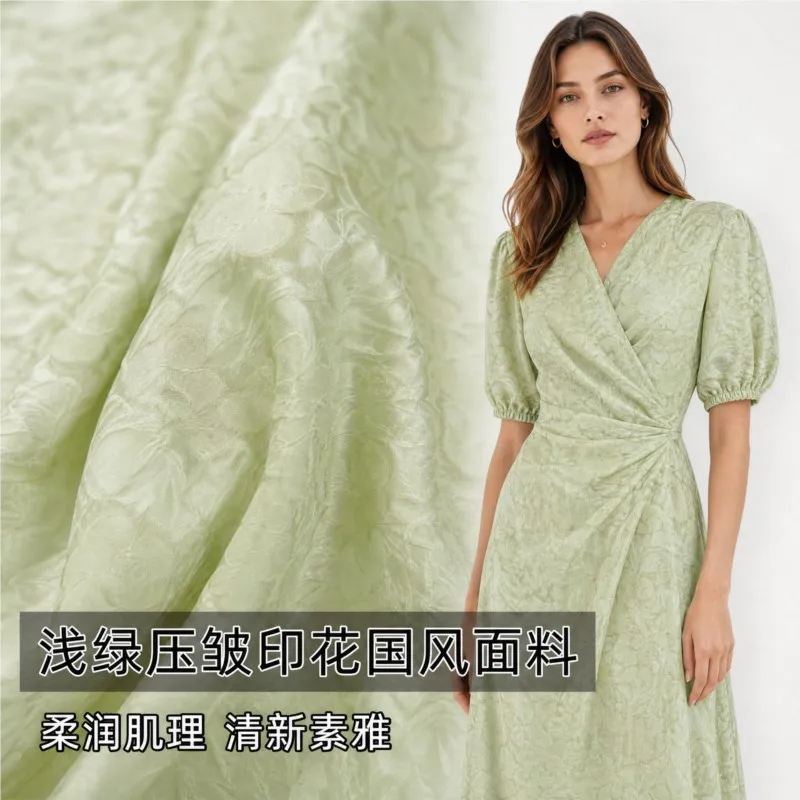 Semi-transparent light green creased floral fabric for dresses shirts and skirts designer