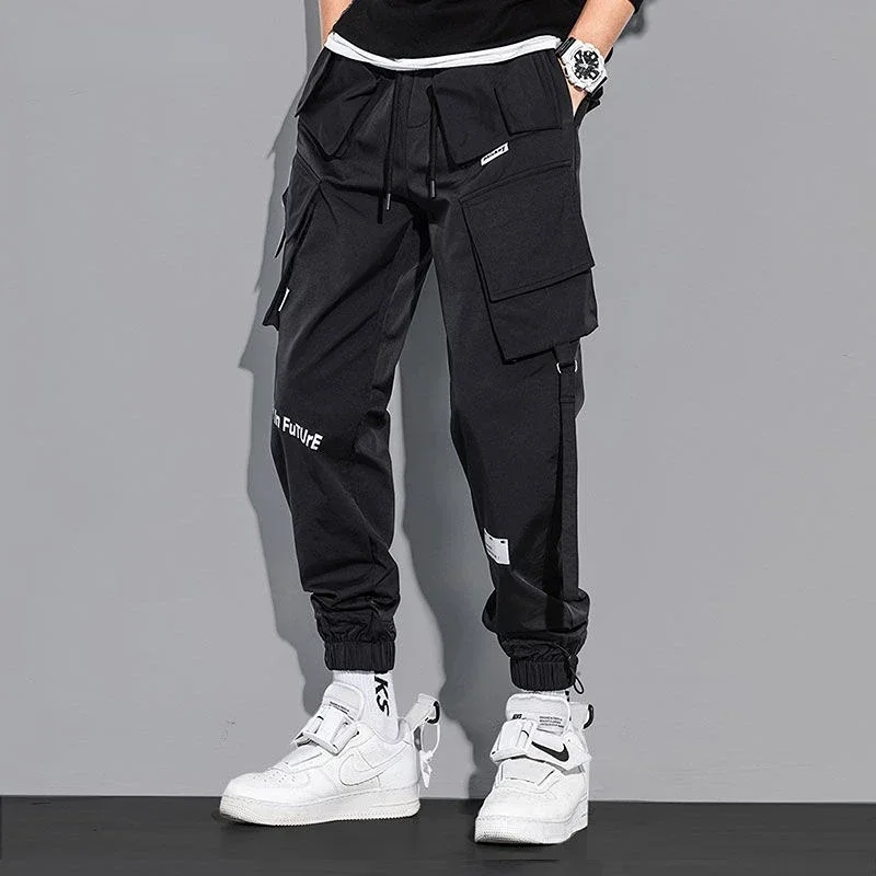 Pantalones Cargo de moda para hombre, ropa de calle informal con múltiples bolsillos, pantalones de chándal sólidos, pantalones Harem sueltos de cintura elástica, Hip Hop